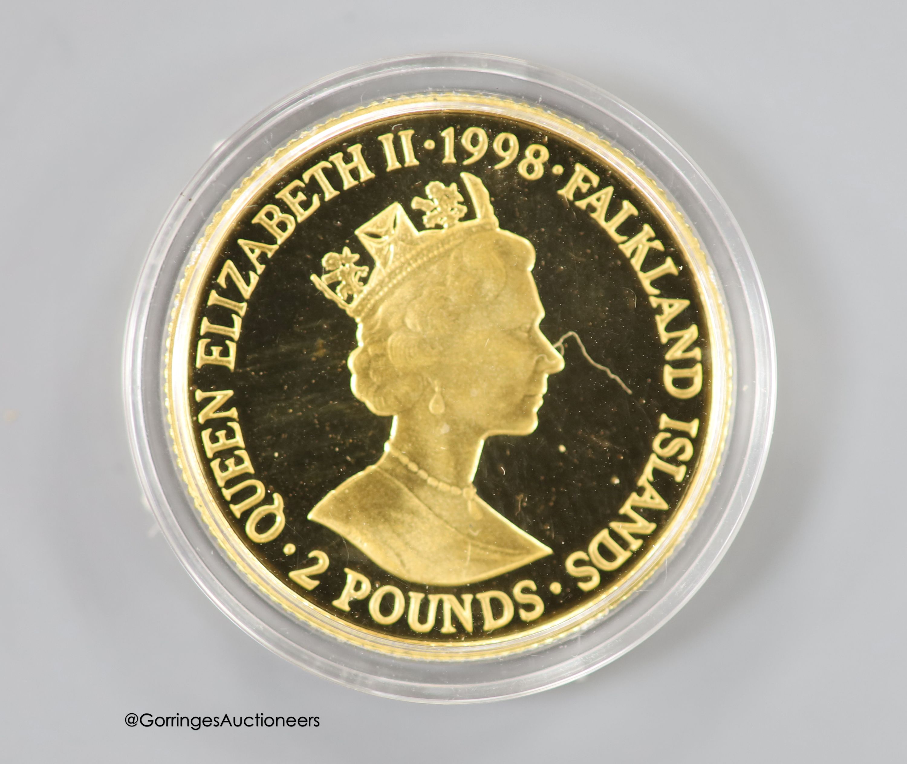 A cased 1998 Queen Elizabeth I Commemorative Falkland Islands 583/1000 gold Two Pound coin.